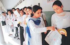 In unending queues, students waited during the annual convocation at MCM DAV College in Sector 36, Chandigarh, on Saturday. 