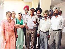 Members of the Punjab Government College Coaches� Association on their way to present a memorandum to Mr Khushal Behl