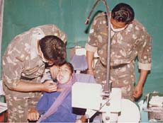 A patient being examined at a medical camp