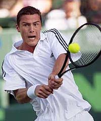 Marat Safin of Russia returns the ball