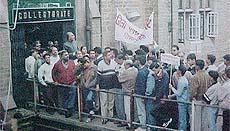Congress activists protest outside the office of the Deputy Commissioner