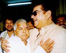 Bollywood star Shatrughan Sinha of the BJP wishes RJD chief Laloo Prasad Yadav