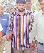 Mohammad Abdulla Mir, Lashkar-e-Tayyeba militant, being produced in Patiala House Courts in the Capital on Wednesday.