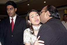 Samajwadi Party leader Amar Singh being greeted by film star Karisma Kapoor