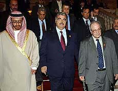 Lebanese Prime Minister Rafik al-Hariri (C), UAE Information Minister Prince Abdullah bin Zaid (L), Farouq al-Kaddoumi (R), head of the Palestinian Political Office of the PLO's delegation to the Arab summit