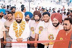 Mr Inder Iqbal Singh Atwal, MLA from Koomkalan, along with Punjabi artistes, at the Narinder Biba cultural mela in Ludhiana on Friday.