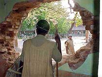 Policemen guard the main wall