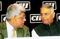 Union Finance Minister Yashwant Sinha flanked by HDFC chairman Deepak Parekh