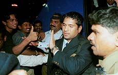 Master blaster Sachin Tendulkar greeted by fans at the Mumbai airport before the team's departure for the West Indies tour on Sunday night. 