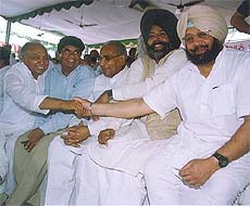 Captain Amarinder Singh, Chief Minister, shakes hands with Mr Surinder Singla, MLA