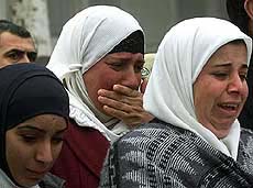 Bereaved relatives of 21 Palestinians killed by Israeli fire cry 