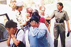 Five women, who were arrested on the charge of stealing a briefcase from an electronics showroom in Sector 22, Chandigarh, on Wednesday.