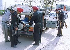 Punjab Police commandos check vehicles 