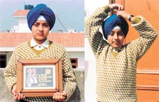 Simarjit Singh with his prize, won at the turban-tying competition