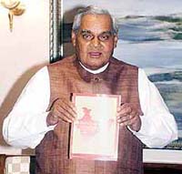 Prime Minister Atal Behari Vajpayee releases a booklet