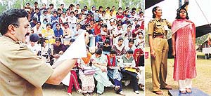 DIG Ajay Kashyap gives instructions to the candidates regarding a written test during recruitment; and (right) a police officer measures the height of a candidate at the Police Lines, Chandigarh, on Saturday.
