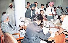 Cases being disposed of at a Lok Adalat held at the Sector 17 District Courts in Chandigarh on Saturday.