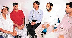 Ram Krishan (28) and Sunil Kumar (35), who were operated upon for renal transplant, interact with a team of doctors, at Silver Oaks Hospital, SAS Nagar.