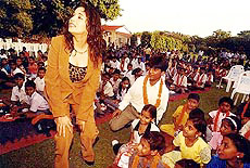 Madhuri Dixit with children at �Basant Utsav� at the Raj Bhavan in Kolkata on Saturday. 