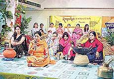 Members of the Roopika Ladies Club and members of other clubs celebrate Baisakhi in Ludhiana on Tuesday.