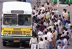 Commuters trying to push into an overcrowded bus as over 6,000 diesel buses remained off the road for the fourth day in the Capital on Tuesday.