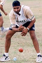 India�s spin bowler Harbhajan Singh works out during a team practice