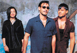 Manisha Koirala, Ajay Devgan and Vivek Oberoi star in �Company�.