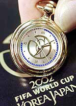 A stopwatch pin is put on sale