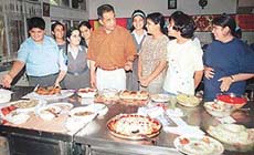 Principal of St Stephen�s School, Sector 45, interacts with the students participating in a cooking competition organised by the old students of St Stephen�s 
