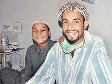 Lal Hussain with his son Farooque