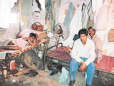 Migrant labourers live in dark and gloomy rooms without proper ventilation.