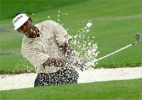 Vijay Singh of Fiji hits from a sand trap