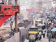 The stretch of road between the Clock Tower and the Railway Station has become a traffic bottleneck due to the ongoing work on the elevated road project.