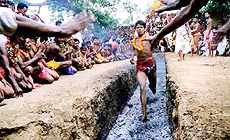 A vakta walks on the fire