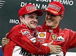 German Ferrari driver and world champion Michael Schumacher celebrates on the podium