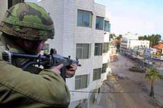 Israeli soldiers take position in the centre of the West Bank city of Ramallah