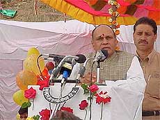 HP Chief Minister Prem Kumar Dhumal addresses a gathering at Kanjyan in Hamirpur district 