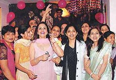 Employees of the VLCC celebrate the fourth anniversary of the VLCC, Sector 8, Chandigarh, on Tuesday.