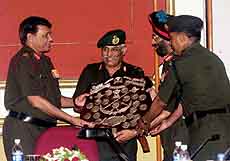 The Chief of the Army Staff, Gen. S. Padmanabhan (left), presents the COAS Silver Trophy