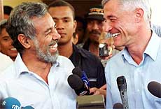 Newly elected East Timor President Xanana Gusmao is all smiles after being congratulated by Mr Sergio Vieira De Mello