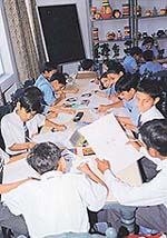 Students of Hansraj Public School, Panchkula, participate in a poster-making competition on Thursday.