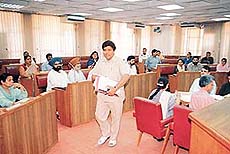 BJP Councillor, Mr Gian Chand Gupta, comes out of the Municipal Corporation House after being expelled by Mayor Lalit Joshi in Chandigarh on Thursday.