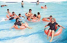 Youngsters cool off in the newly introduced wave pool in Funcity on Saturday.