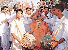 The resident-acharya of Sree Chaitanya Gaudiya Math, Srila Bhakti Ballabh Tirtha Goswami Maharaj, leads the Rath Yatra Sankirtan procession in Sector 20, Chandigarh, on Saturday.