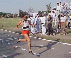 An athlete of Border Zone crosses the finish line