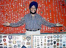 Bangalore based Narendrapal Singh Chugh with a large collection of metal and embroidery badges