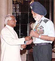 President K. R. Narayanan presents the Baton of the Marshal of the Air Force