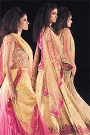 Indian models present ethnic outfits by Indian fashion designer Tarun Tahliani