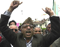 An activists of Jammu Kashmir Pradesh congress shout anti POTA slogans during a protest demonstration at their headquarters in Srinagar