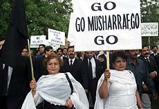 Pakistani lawyers hold placards